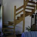Scala in rovere con doppia curva